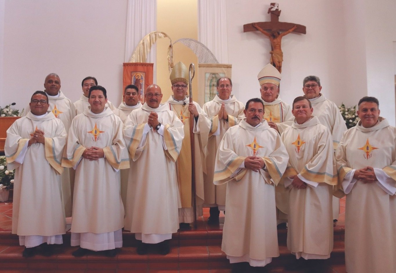 Newly ordained permanent deacons with Bishop Rojas