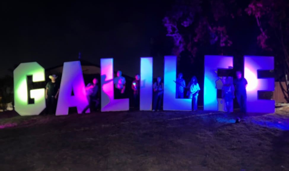 Giant GALILEE letters glowing at night at last year’s festival