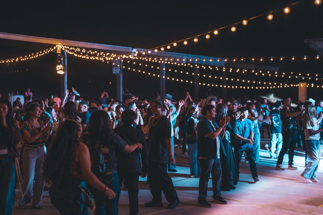 Dancing under string lights